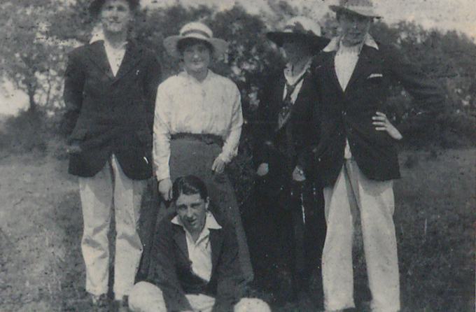 Black and white snapshot of Tommy and Mrs Armstrong with Ivan Campbell, Redvers Coate (seated) and Francis Dalby